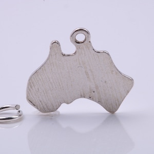 Breloque australienne, breloque traditionnelle, fabriquée en argent sterling massif 925, complète avec lien de fixation.