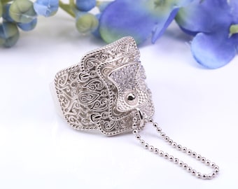 Cubic Zirconia set Saddle ring, made from solid cast silver