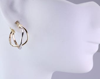 Pendientes criollos de aro bicolor de 20 mm de largo, elaborados en oro amarillo y blanco de 9 quilates.