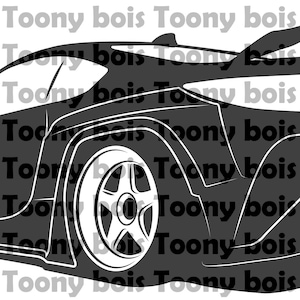 May include: A black and white silhouette of a sports car with a large rear wing. The car is viewed from the back, with the driver's side facing the viewer. The car has a large rear tyre and a small front tyre.