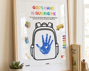 May include: A framed print featuring the text "GOD'S HAND IS GUIDING ME" and "For I am the Lord your God who takes hold of your right hand and says to you. Do not fear; I will help you. ISAIAH 41:13". It shows a backpack outline with a blue handprint.