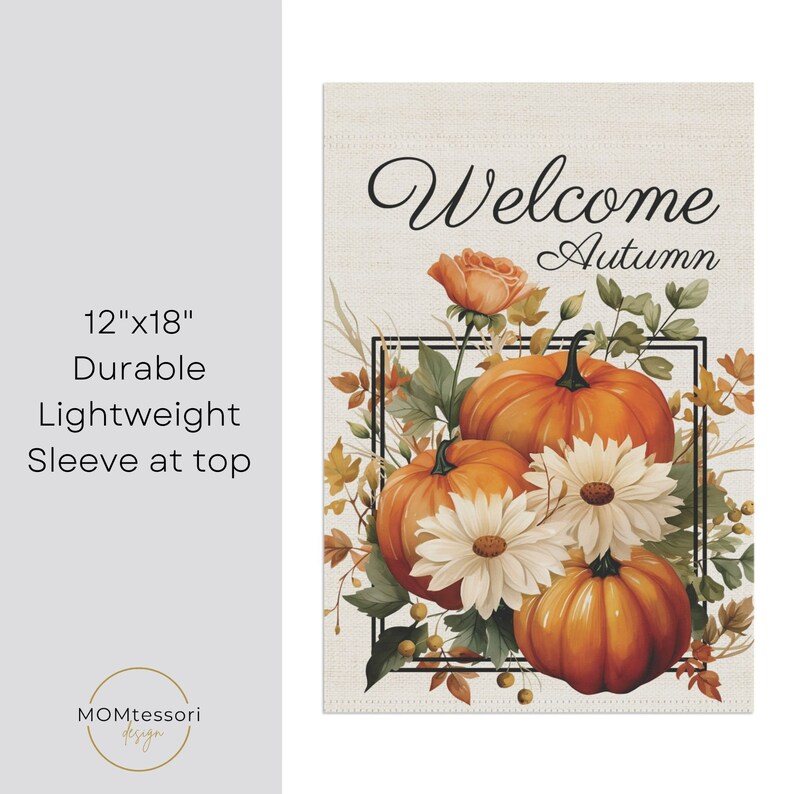 A garden flag featuring a watercolor design with the text "Welcome Autumn." The flag showcases orange pumpkins, white daisies, and a peach rose, framed by green and brown foliage. The flag is 12"x18" and has a sleeve at the top.