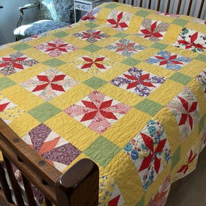LeMoyne star quilt, patchwork stars hand quilted feed sack quilt vintage. 90 X 78