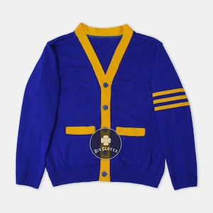 Suéter unisex hecho a mano de punto jacquard azul real y amarillo con letras bordadas para graduación, ropa griega, para la escuela, la universidad y las animadoras