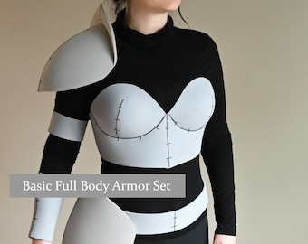 May include: A gray foam full body armor set with a corset style chest piece, shoulder pads, and arm guards. The armor is worn over a black shirt and pants.