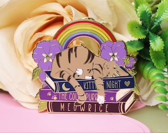 Tabby Cat on Book with Puns and Rainbow - Hard Enamel Pin