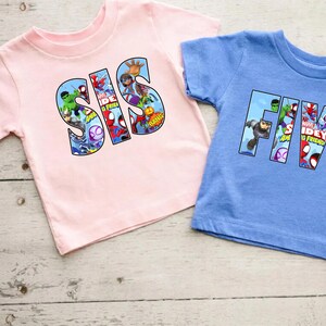 May include: Two t-shirts, one pink and one blue, with a Marvel superhero theme. The pink shirt says "SIS" with a Spiderman and other superhero characters. The blue shirt says "FIVE" with a Spiderman and other superhero characters.