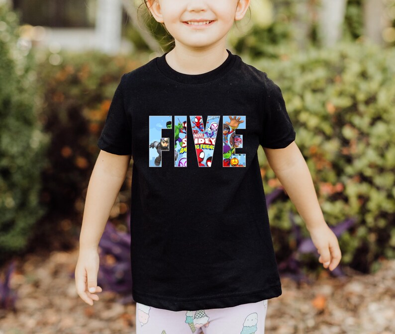 May include: Black t-shirt with the word "FIVE" spelled out in large letters. The letters are filled with images of Spider-Man and other Marvel characters.