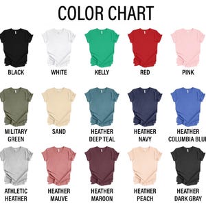 May include: Color chart showing 15 different t-shirt colors. The colors are: black, white, kelly green, red, pink, military green, sand, heather deep teal, heather navy, heather columbia blue, athletic heather, heather mauve, heather maroon, heather peach, and heather dark gray.