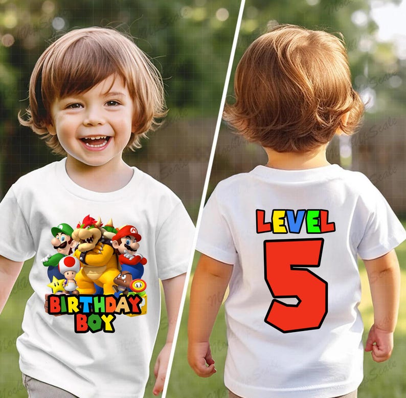 May include: White t-shirt with a colorful Mario character graphic on the front and the text "Birthday Boy". The back of the shirt has the text "Level 5" in colorful letters.