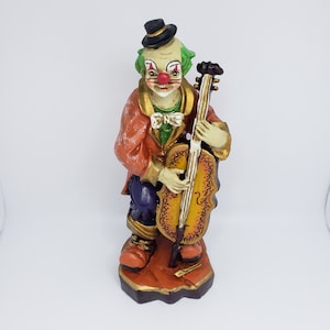 Ceramic Circus Clown Playing The Cello Figurine