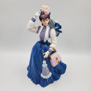 Figurine vintage Avon Mrs Albee Award Presidents Club 1996-1997