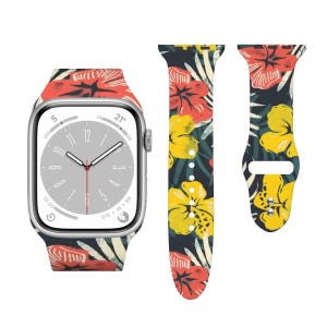 a watch band with a floral pattern on its strap and a watch face with a floral pattern on its face.