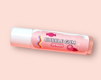 May include: Pink lip balm tube with a white cap. The label has a pink background with white text that reads "Bubble Gum Lip Balm". There are cartoon images of a candy and a bubble.