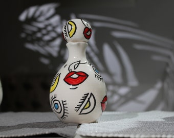 small handmade ceramic bottle