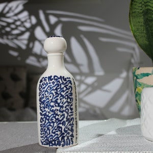 Handmade ceramic oil bottle with arabic letters