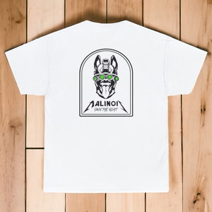 May include: White t-shirt with a black and white graphic print of a dog wearing goggles. The graphic includes the text "ALINOI OWN THE NIGHT".
