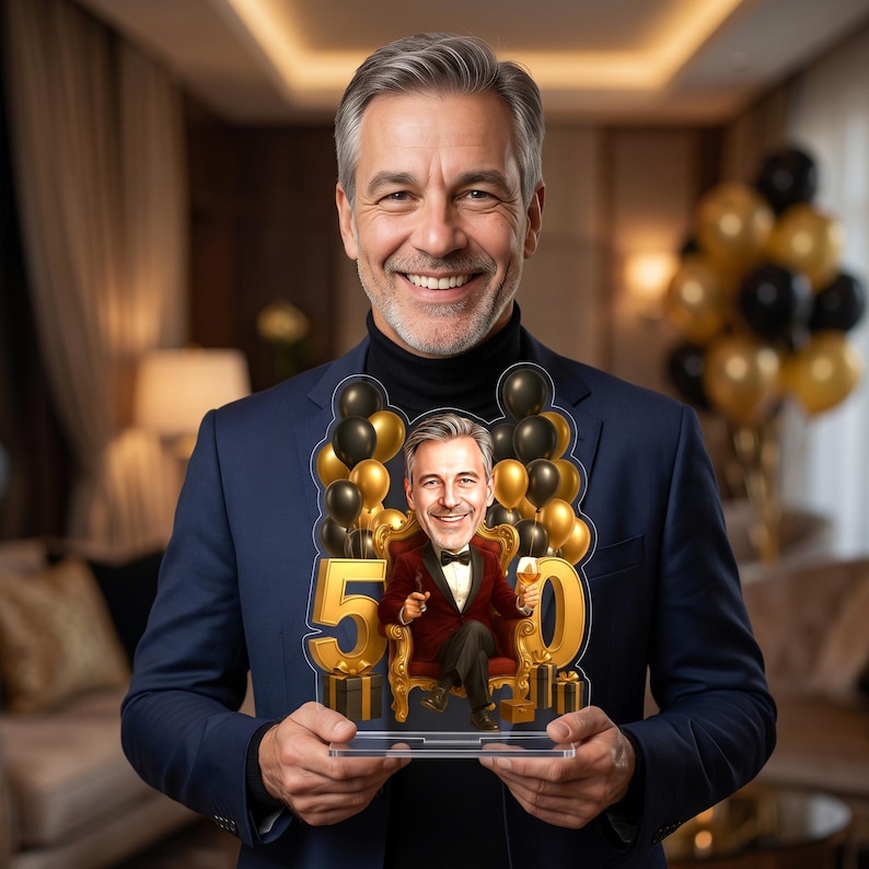 May include: A custom acrylic plaque featuring a caricature of a person in a tuxedo sitting on a gold chair, surrounded by black and gold balloons and the number 50. The design includes gift boxes and a glass of beverage, all set on a clear base.