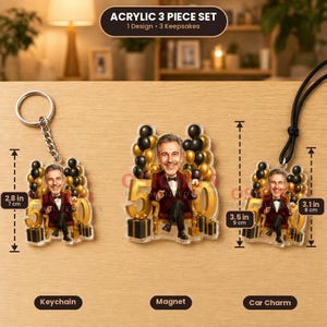 May include: An acrylic 3-piece set featuring a keychain, magnet, and car charm with a cartoon illustration of a person in a suit sitting on a chair with balloons and the number 50. The keychain is 7 cm, and the car charm is 8 cm tall.