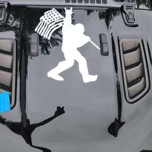 Walking Peace Sign Sasquatch carrying American Flag Hood Decal Sticker Fits Jeep Wrangler Gladiator and Ford Bronco
