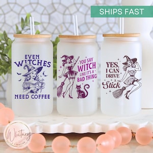 May include: Three frosted glass tumblers with bamboo lids and straws. Each tumbler features a different witch-themed design with purple text. The first tumbler says "Even Witches Need Coffee". The second tumbler says "You Say Witch Like It's A Bad Thing". The third tumbler says "Yes, I Can Drive A Stick".