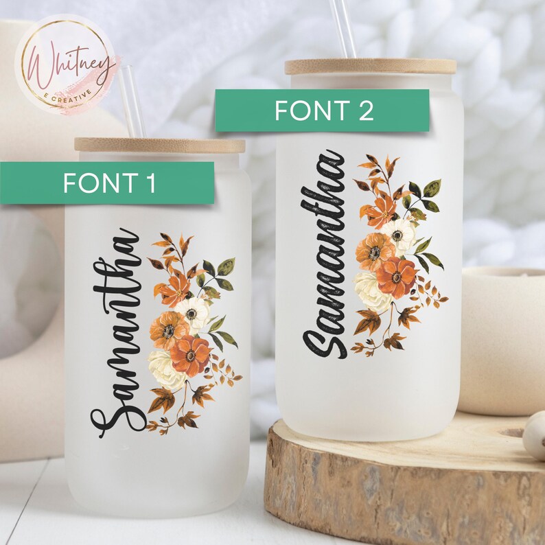 May include: Two frosted glass tumblers with a floral design and the name Samantha on them. The tumblers are on a wooden surface. The text "FONT 1" and "FONT 2" are on the image.