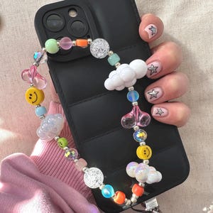 Lindo dije para teléfono con cuentas de nube de caramelo de arcoíris