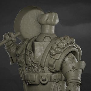 May include: A detailed, gray 3D-printed figurine of a chef in armor, holding a frying pan and a key-shaped weapon. The chef wears a toque and has a belt with pouches. The figurine stands on a circular base with a brick pattern.