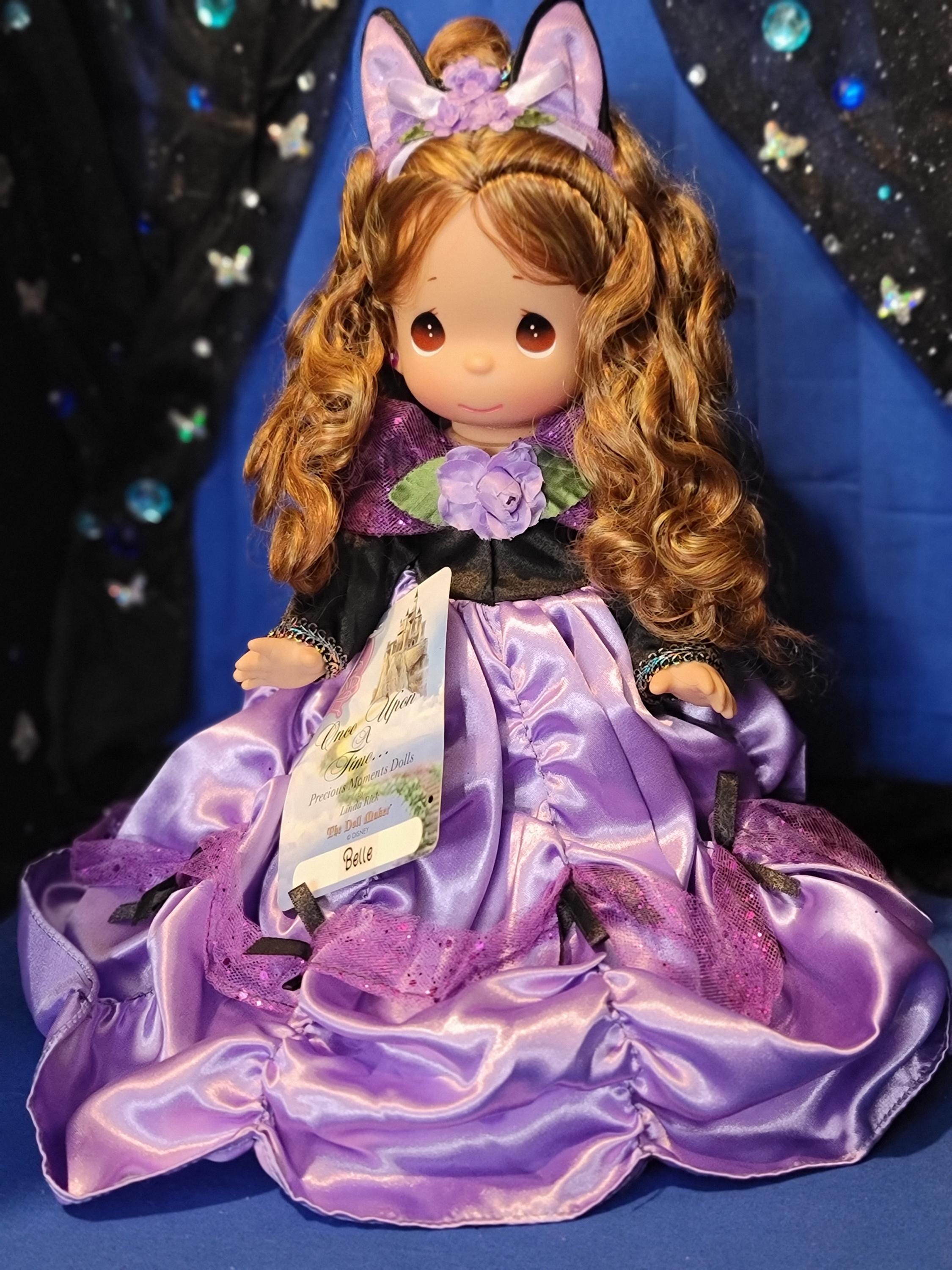 princess belle purple dress Princess Belle in her beautiful purple dress and holding a beautiful red rose