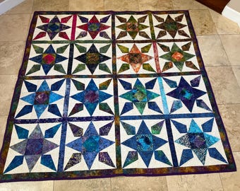 Trapunta batik multicolore "Dodici stelle guida".