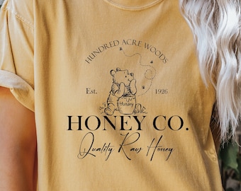 Comfort Colors Vintage Hundred Acre Woods Honey Co. Shirt,Classic Pooh Bear Shirt, Disneyland shirt  Winnie The Pooh est 1926 Shirt,