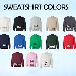 Peut inclure: Un tableau pr&eacute;sentant 15 couleurs de sweat-shirts diff&eacute;rentes. Les couleurs sont&nbsp;: Blanc, Noir, Gris sport, Sable, Gris fonc&eacute; chin&eacute;, Marine, Royal, Vert irlandais, For&ecirc;t, Rouge, Bourgogne, Rose clair, Gris cendr&eacute;.