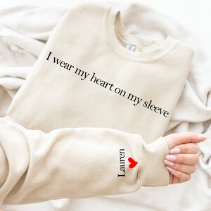 Heart on my sleeve sweater online