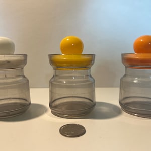 Set of three vintage containers