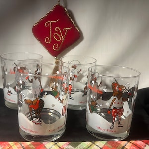 Set of four Neiman Marcus Merry Fitness vintage tumblers