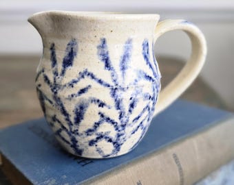 Vintage Blue and White Pottery Creamer with Floral Design