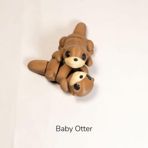 3D Printed Baby Otter Sculpture - Adorable Collectible Figure for Holiday Decor