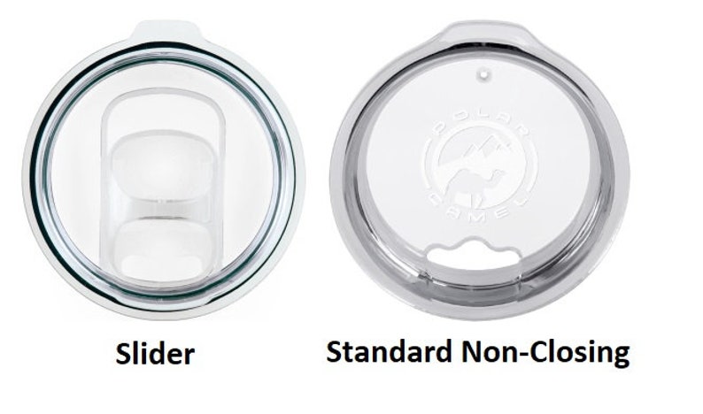 May include: Two clear plastic lids for a travel mug. The lid on the left has a slider mechanism. The lid on the right is a standard non-closing lid.