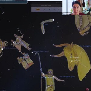 May include: A computer screen displaying a star chart with constellations and their names, including the Great Twins, Little Twins, Crook, Steady Wild Sheep, True Shepherd of Anu, Lulal and Latarak, and the Bull of Heaven. The chart is set for the year -500, with the date and time set to 3-21. A woman is visible in a video call window at the top of the screen.