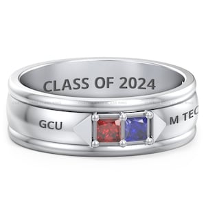 May include: A silver class ring with red and blue gemstones. The ring is engraved with "CLASS OF 2024", "GCU", and "M TEC".