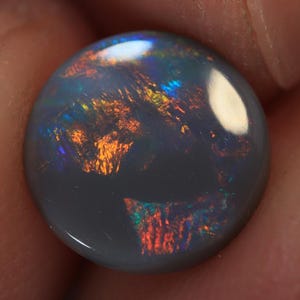 1,25 ct. Lightning Ridge halvsvart opal TOG-1256