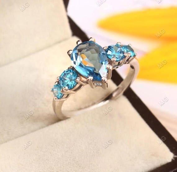 Natural Swiss Blue Topaz Ring Pear, Round Shape Sterling Silver