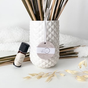 Diffuseur d'huiles essentielle à suspendre.