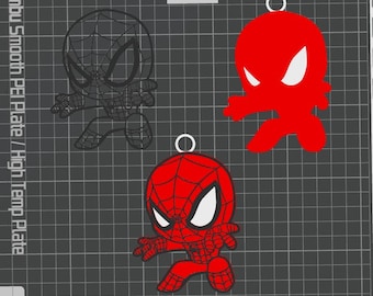 May include: Three red and black cartoon Spider-Man figures with a white background. The figures are in a fighting pose with their arms and legs outstretched. The figures are approximately 2 inches tall.
