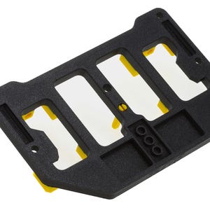 May include: Black plastic storage organizer with four slots and yellow dividers. The organizer has a textured surface and is designed to hold small items.