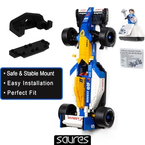 May include: A blue, yellow, and white Williams-Renault FW16B race car model made of interlocking plastic bricks. The model includes black tires and a small figurine. Also included are black mounting brackets and a printed information card. The text on the image says "Safe & Stable Mount, Easy Installation, Perfect Fit."