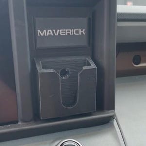 Black Maverick dash cubby bank
