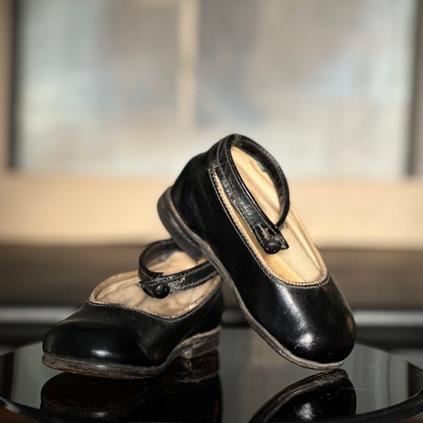 1930s children's shoes with strap, black leather nailed sole with a small heel, Bluis small antique Shirley Temple style shoes