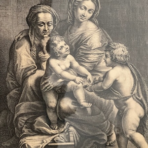 May include: A black and white engraving of a family group. A woman with a headscarf holds a young child on her lap. An older woman sits beside them, and a young boy stands to the right. The family is surrounded by drapery.