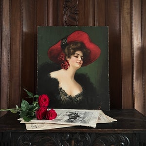 Cartel publicitario antiguo con imagen de dama con sombrero rojo del pintor B. Zickendraht, hacia 1900-1910, objeto de exposición de Jules Samuel.